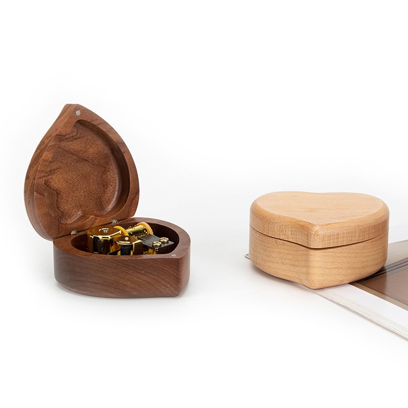 Caja de música de madera maciza con mecanismo a mano